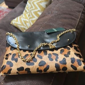 Brand name crossbody with tag